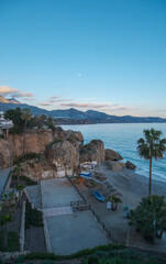 Nerja Cliff Houses Boats Sunset Glow