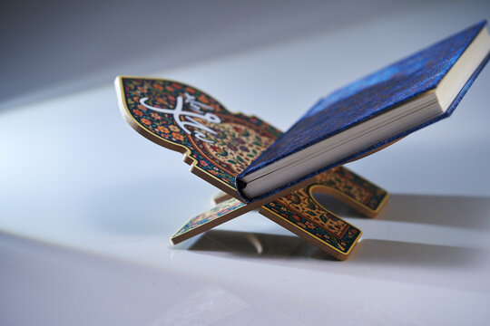 holy koran on top of bookstand