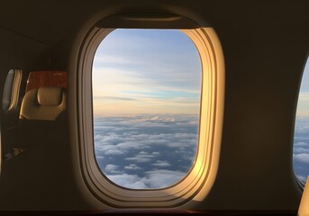 Fototapeta premium Private jet window view overlooking endless clouds and blue sky at cruising altitude