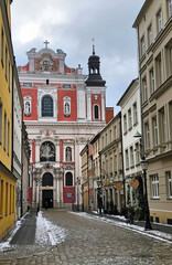 Fototapeta premium Street to Fara church - Poznan, Poland