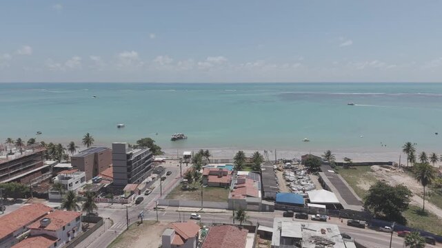 PASSEIO DE DRONE EM AREIA VERMELHA MOSTRANDO O MAR E AREIA, PASSEIO LINDA COM O MAR AZUL E C&Eacute;U LINDO E LIMPO (Drone tour over Areia Vermelha showcasing the sea and sand, a beautiful tour with the blu)