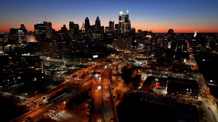 Obraz premium Sunset Philadelphia Skyline In Philadelphia Pennsylvania United States. Bustling Downtown Cityscape With Modern Buildings. Building Town Sky Clouds Illumination Urban. Exterior Famous.