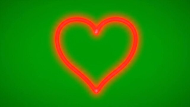 Neon red heart outline glowing on a green background with a white space below.
