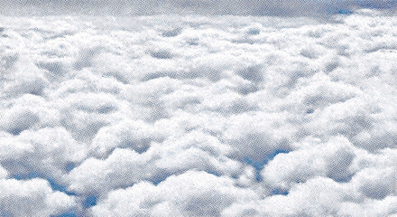 Obraz premium halftone print texture of an aerial view above a sea of fluffy cumulus clouds a retro graphic design background element.