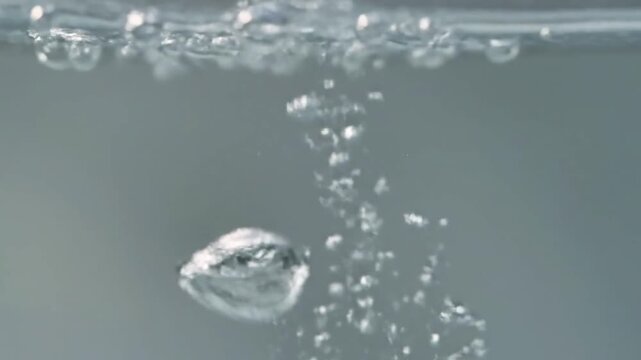 Subsurface Effervescence The mesmerizing, gentle rise of bubbles from beneath a liquid surface.