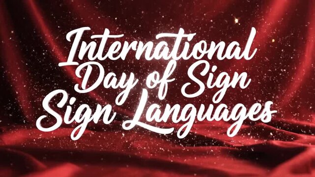 International Day of Sign Languages white text on red velvet fabric