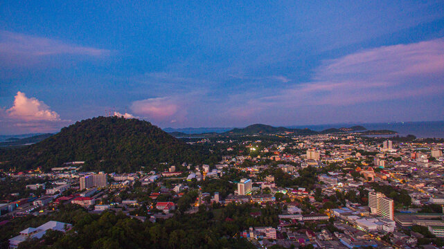 aerial view of Khao Rang viewpoint in sunset.Khao Rang viewpoint tower landmark in Phuket town it is on Tung Ka hill.on Khao Rang viewpoint can see around Phuket and watching sunrise and sunset