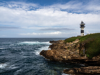 Pancha Island Lighthouse in Ribadeo, Lugo, Galicia, Spain.
