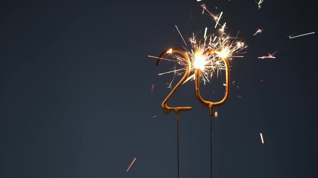 20th anniversary festive footage made with Bengal fire forming the number twenty