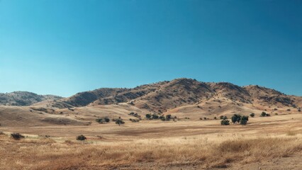 Rolling Hills Landscape with Clear Blue Sky