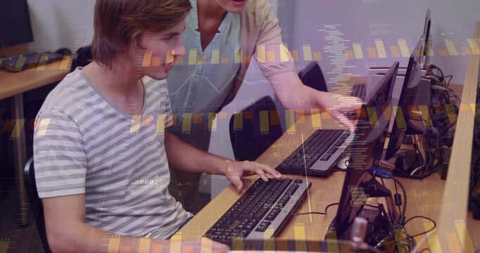Instructor leaning over student, pointing at screen, guiding typing for class with animated charts