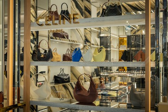 Milan, Italy - 2026, 3 Feb: Celine FW25 handbags showcased in a luxurious boutique window, highlighting premium design and elegant style in the heart of Milan