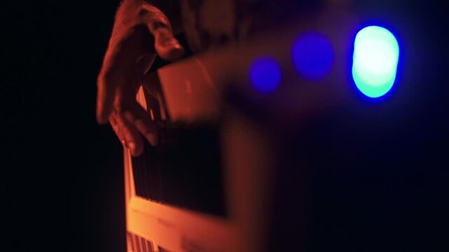 Keytar music player in red light