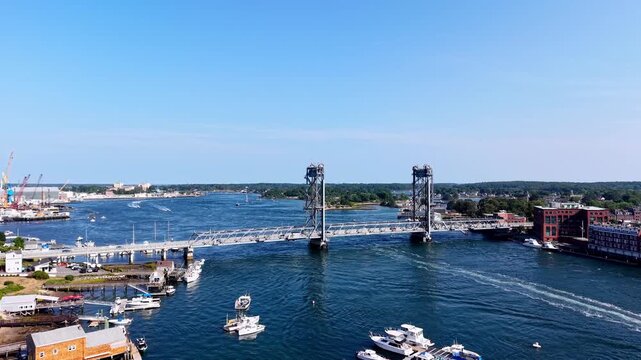 Aerial View of the Memorial Bridge connecting Maine and New Hampshire over the Piscataqua River shot from Badgers Island in Kittery Maine