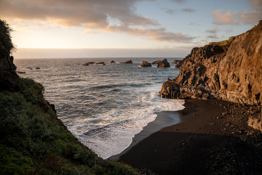 Volcanic black sand beach and Atlantic ocean coastline on La Palma island