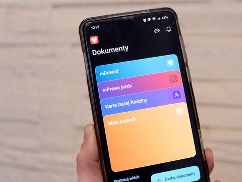 mObywatel is a polish application offering mobile versions of digital ID, documents and public services. Smartphone or mobile phone screen showing mObywatel app - Wroclaw, Poland - February 3, 2026