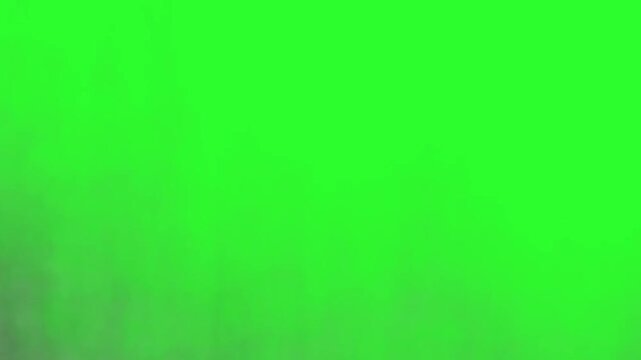 Realistic smoke and fire cloud animation on green screen background. This dynamic VFX effect creates an intense atmosphere of explosion, destruction, or dramatic cinematic scene.