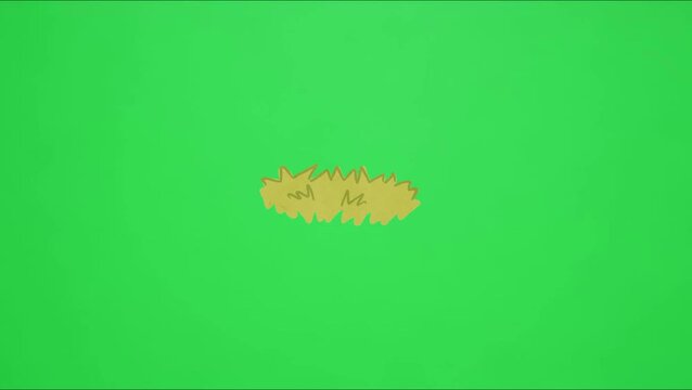 A video showcasing a yellow object on a green background