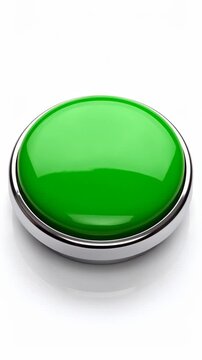 Shiny green button with metallic trim on a reflective white surface