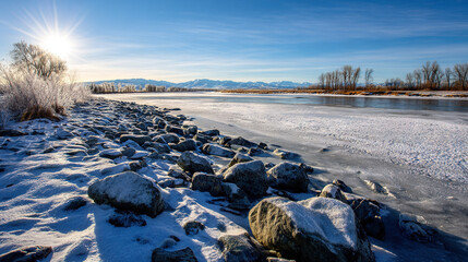 Frozen Riverbank with Snow-Covered Rocks