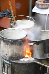 Cooking Pots on an Outdoor Stove at a Street Food Market in Hanoi, Vietnam