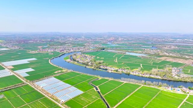 Aerial Rural Countryside with River, Green Fields and Farming Villages