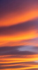 Obraz premium Golden hour atmosphere featuring dramatic orange and purple hues across the vast expanse of the natural sky and soft flowing cloud formations, vibrant, twilight, dramatic