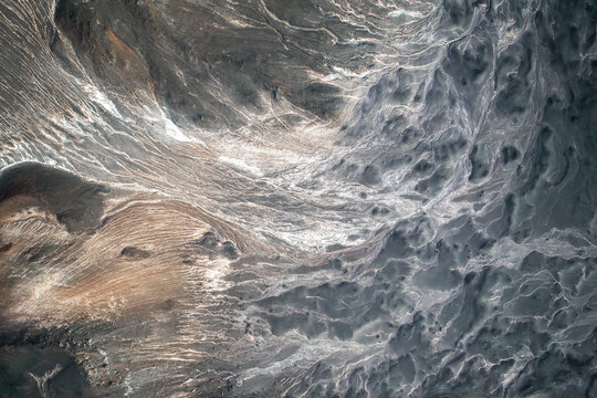 Volcanic landscape with solidified lava and textures