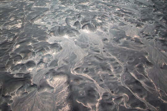 Patterns of solidified lava in volcanic landscape