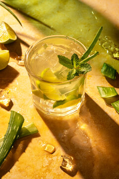 Refreshing aloe mojito cocktail with mint and lime