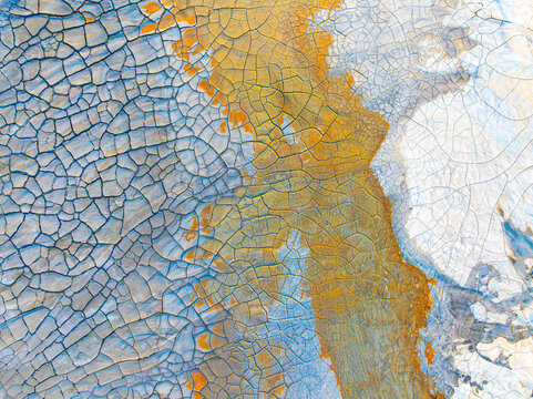 Aerial view of contaminated soil with cracked textures