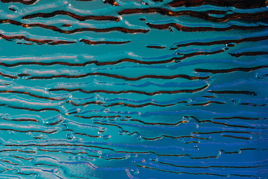 Abstract holographic pattern on embossed glass