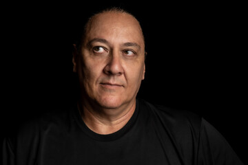 Obraz premium Young Brazilian gentleman, photo of a young gentleman from Brazil, black background, selective focus.