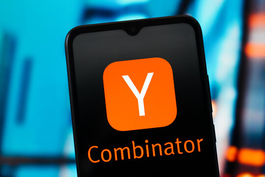 In this photo illustration, the Y Combinator logo is seen displayed on a smartphone screen.