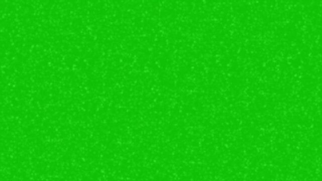 Film grain texture shows fine organic noise with a clean cinematic look on green screen. Designed as subtle grain overlay. Ideal for chroma key compositing, film edits, and cinematic video projects.