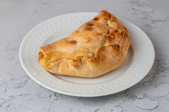 Homemade Italian Panzerotti Pizza Calzone, Cheese and Sauce