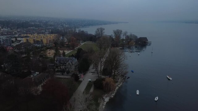 Aerial view of Zurich Lake and city skyline during a misty winter day, Switzerland.