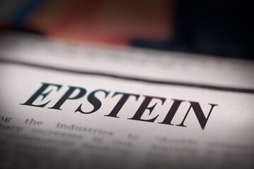 Close Up Photo of Newspaper Headline with Epstein