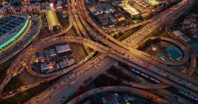 Jaw-dropping view of multi-lane interchange with lively traffic. Rush hour in Los Angeles, California, USA from drone.