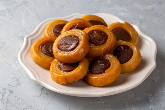 Greek Traditional Delights Syrup Pastries, Roxaki or Roxakia - Turkish name; Karag&ouml;z tatlisi or Karagoz tatlisi