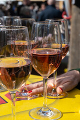 Naklejka premium Wine festival featuring wines from regions of Austria in Rathausplatz, Vienna, tasting of white, rose and red wine glasses