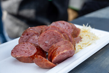 Street food at wine festival in Vienna, Austria, chicken legs, burgers, sandwiches, sausages, tasty food in small portions, lunch