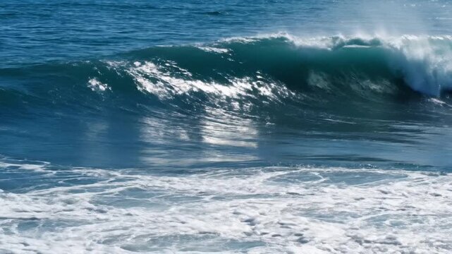 Man surfing on a wave at the beach with splashing water in the background