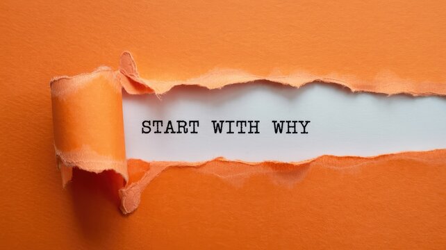 Motivational phrase START WITH WHY revealed through ripped vibrant orange paper with a clean white b