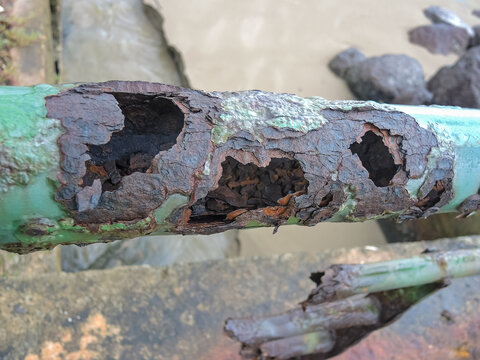 metal railing badly deteriorated by rust