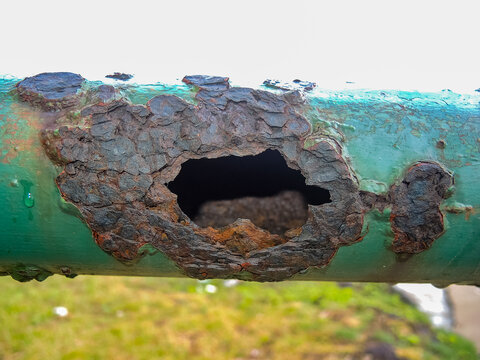 metal railing badly deteriorated by rust