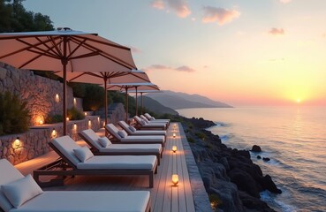 Naklejka premium Empty resort lounge chairs on wooden deck face ocean at sunset. Rocky coastline meets calm sea under soft sky. Umbrellas provide shade on sunny vacation spot. Serene twilight atmosphere.