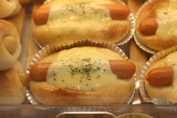 Delicious bread is available for sale in the glass display case.