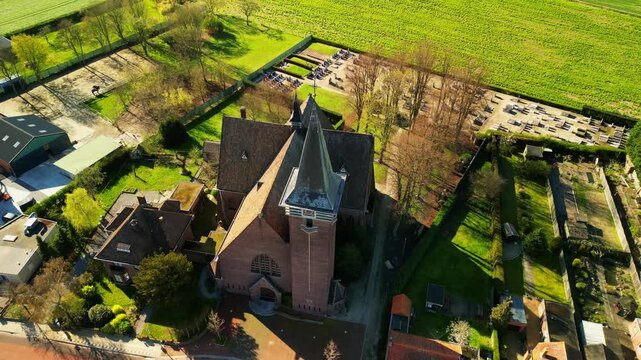 Church in rural Flanders - Orbiting Aerial Footage