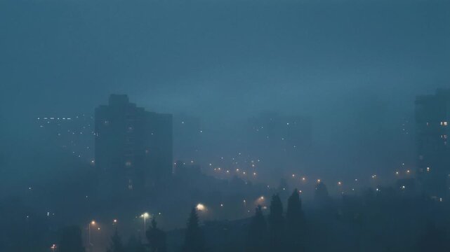 Mysterious Foggy Cityscape with Silhouetted Buildings and Distant